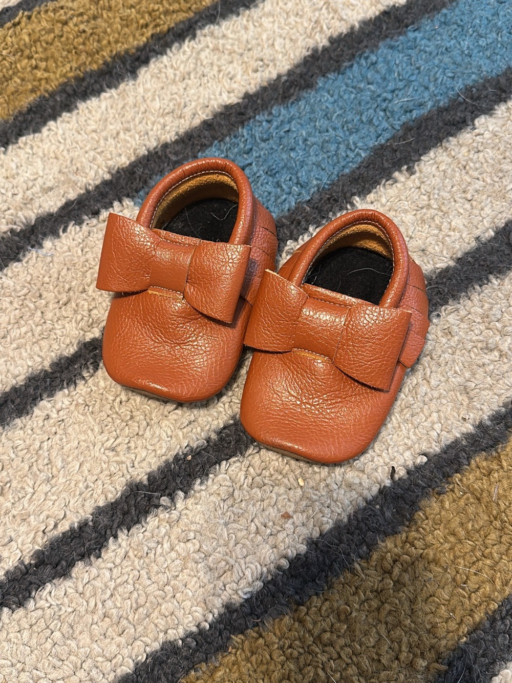 Classic Toddler Bow Moccasins in Rust Brown